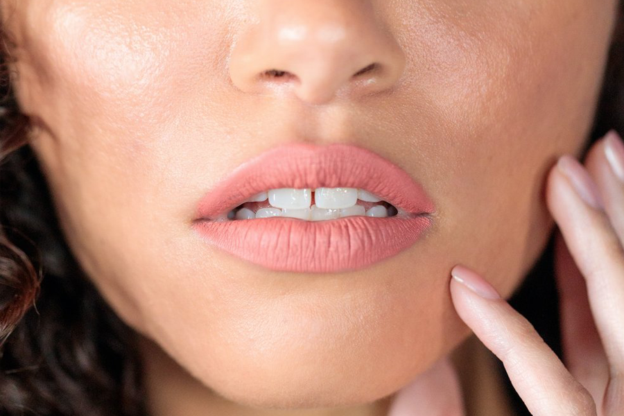 girl showing her teeth